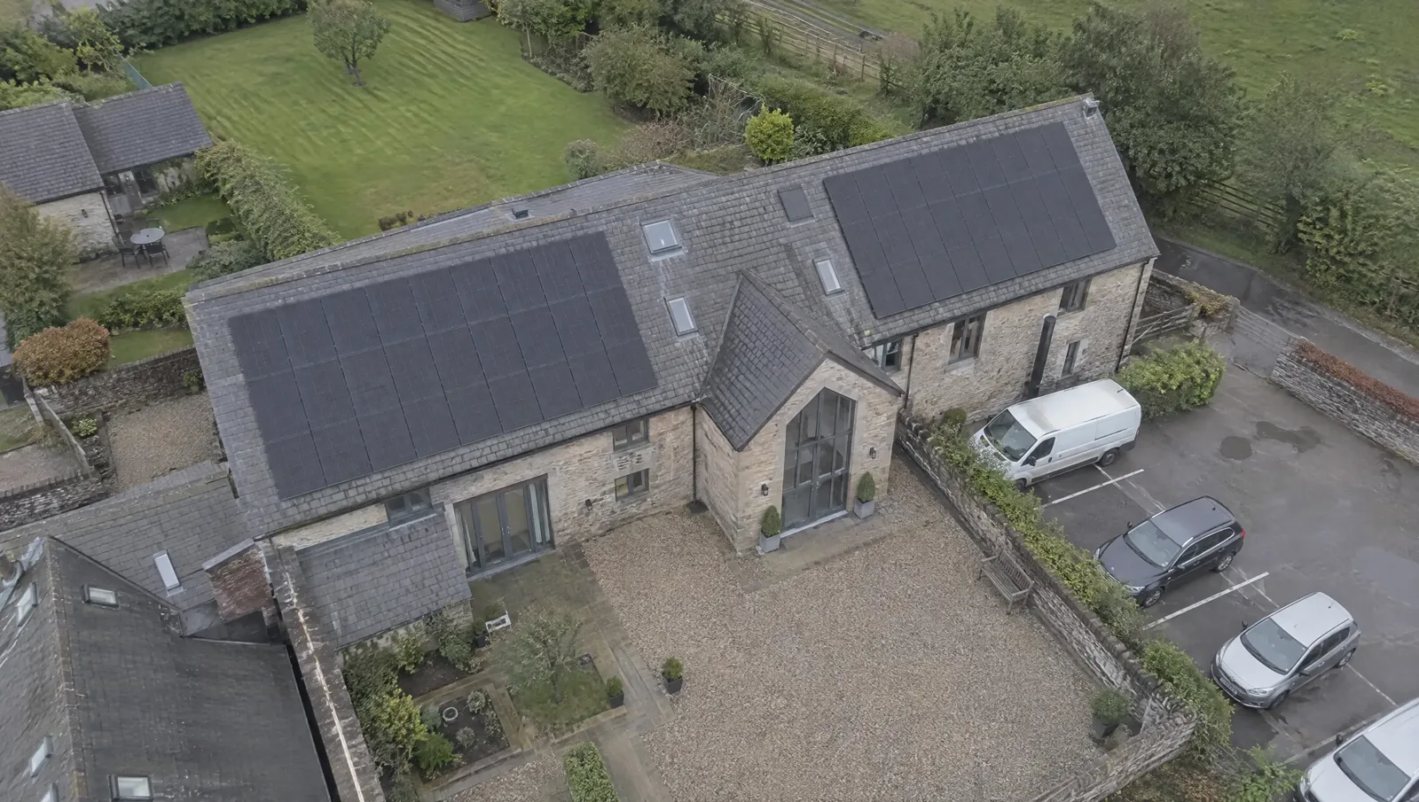 Pitched commercial roof fitted with solar panels